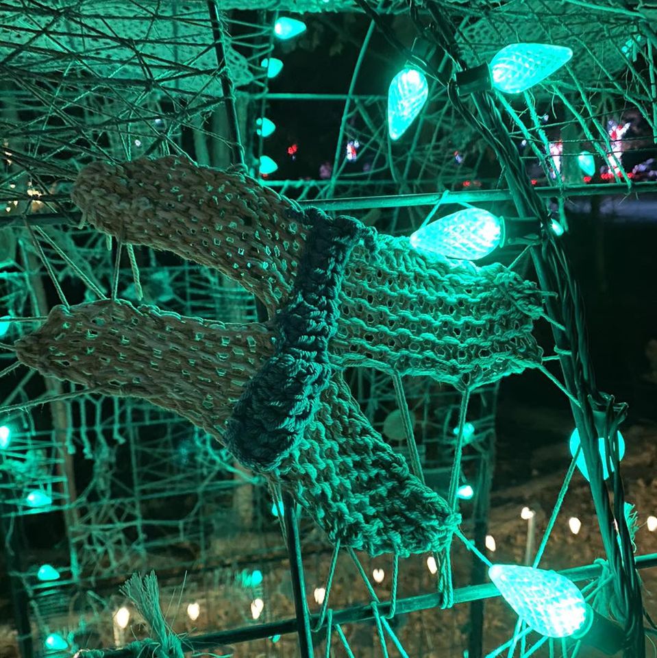 knit butterfly on a lighted arch
